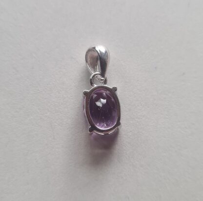 Jemagic amethyst pendant on silver background - Back View
