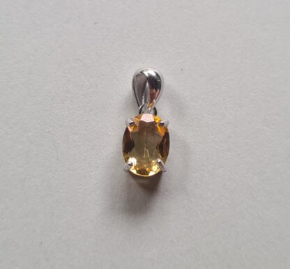 Jemagic citrine pendant on silver background