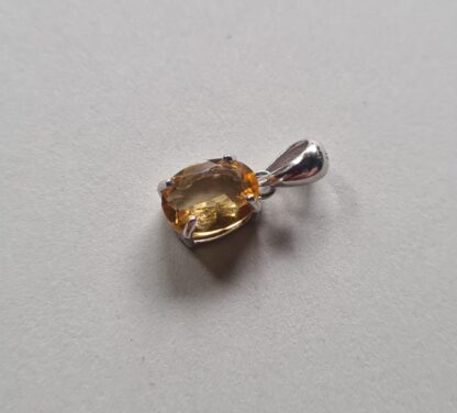 Jemagic citrine pendant on silver background - Side View