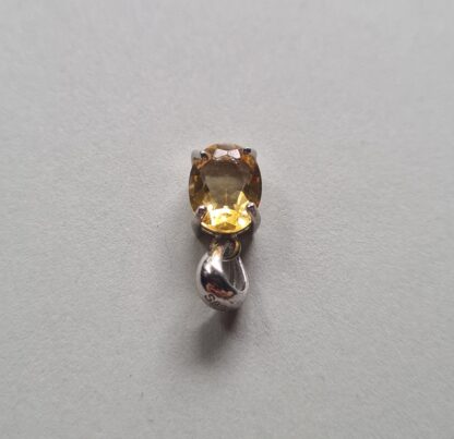 Jemagic citrine pendant on silver background - Top View
