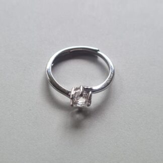 Jemagic White Topaz Ring on Silver Background