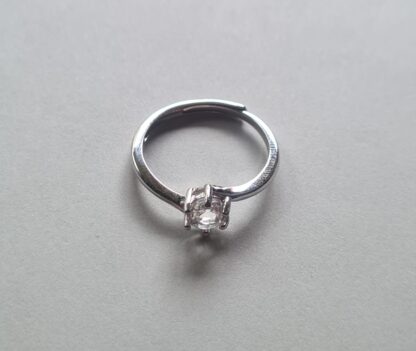 Jemagic White Topaz Ring on Silver Background