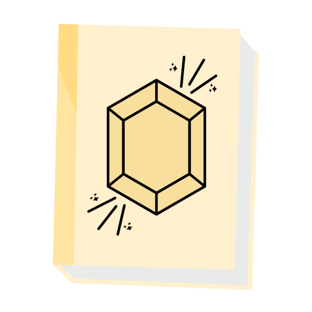 A yellow book with a citrine gemstone on the front