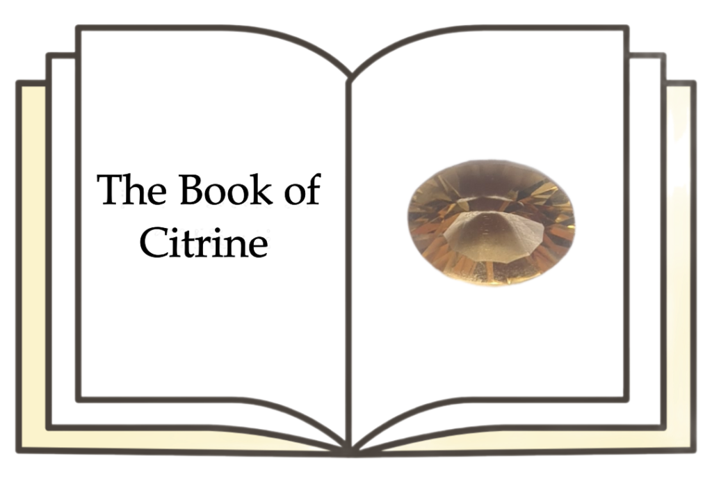 An open yellow book with a citrine gemstone illustration