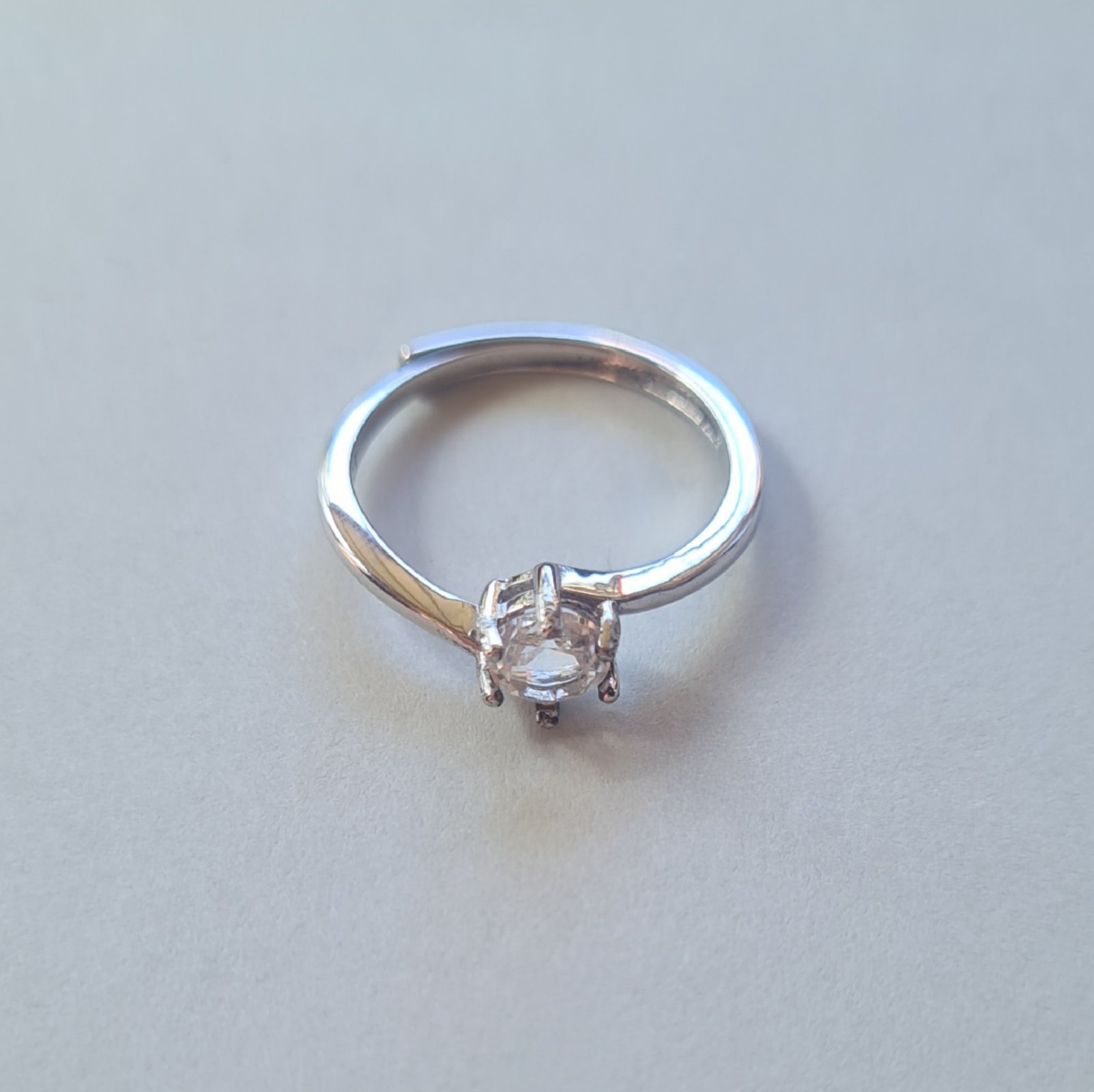 5mm Jemagic white topaz ring on silver background 5mm Jemagic white topaz ring on silver background