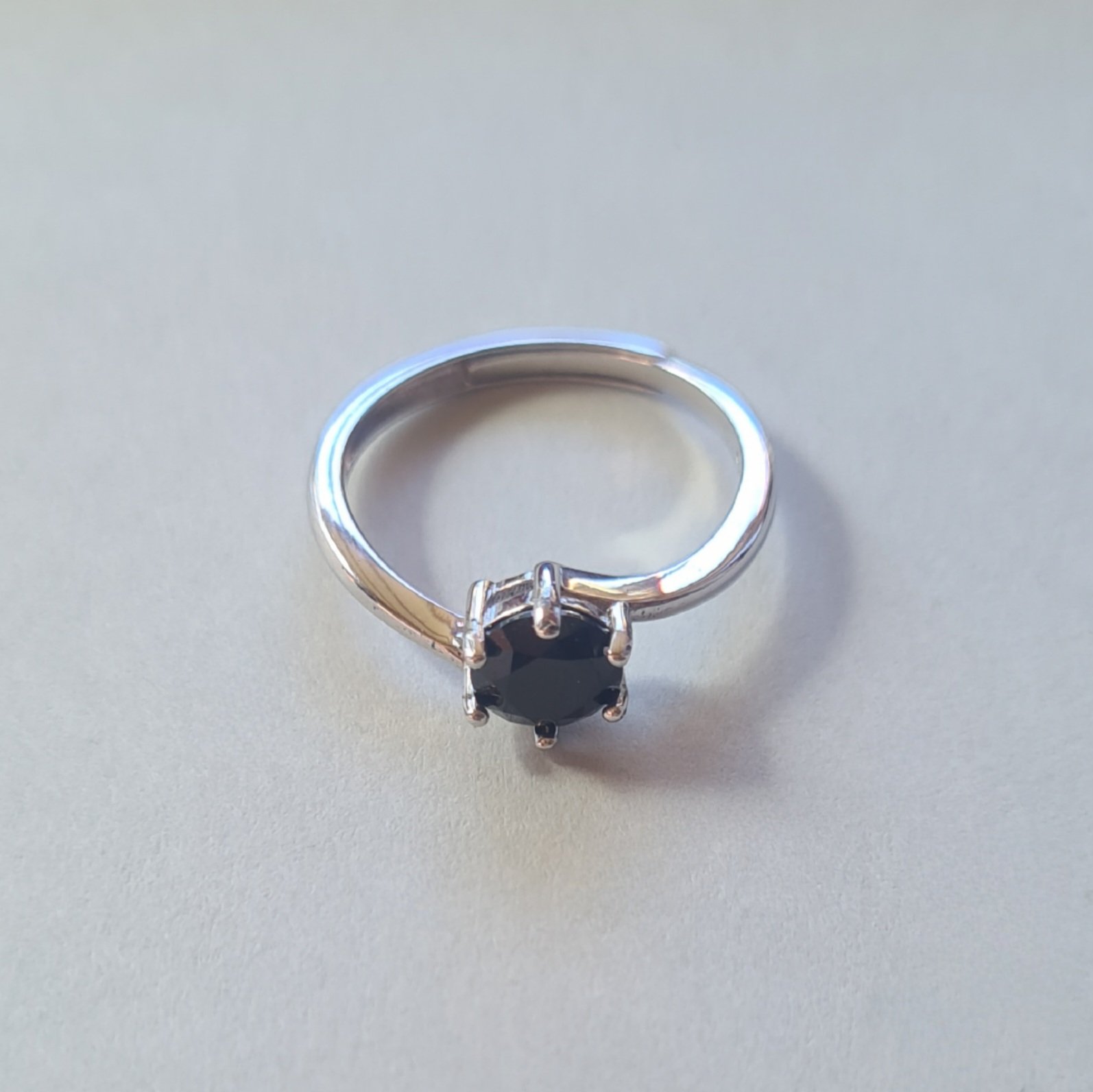 6mm black spinel ring on silver background Jemagic 6mm black spinel ring on silver background