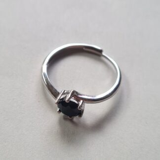 Jemagic black spinel ring on a silver background