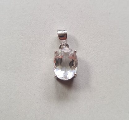 Jemagic white topaz pendant on silver background