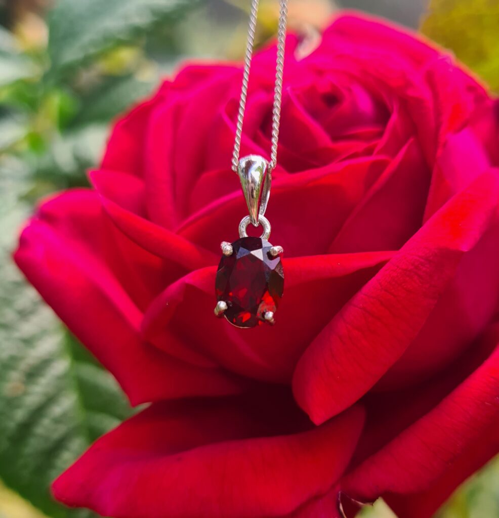 Jemagic Garnet Pendant with Red Rose Background