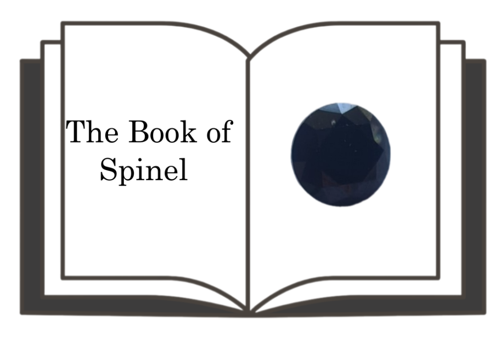 An open black book with a black spinel gemstone illustration