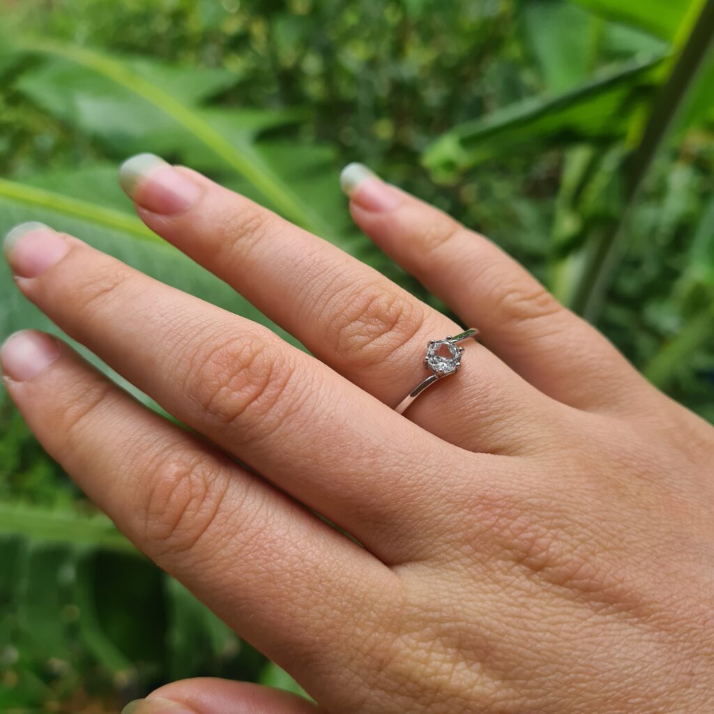 Jemagic white topaz ring on right hand