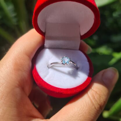 Jemagic blue topaz ring in a red ring box